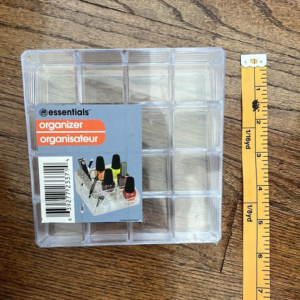 Clear plastic lucite -like cosmetics organizer